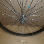 Wheel 24 x 1.75 front BO black steel 5/16 in axle