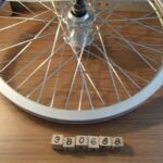 Wheel Front 20 x 1.75 BO Silver Alloy SW 14 mm axle 48 hole axle about 6 in long