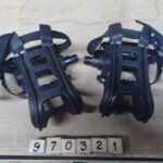 Pedals nylon body with steel cage includes toe strap and clip 9/16 in black